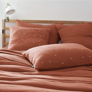 Taie d'oreiller à pois brodés double gaze de coton orange terracotta